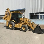 Traktorbagr s bočním posunem